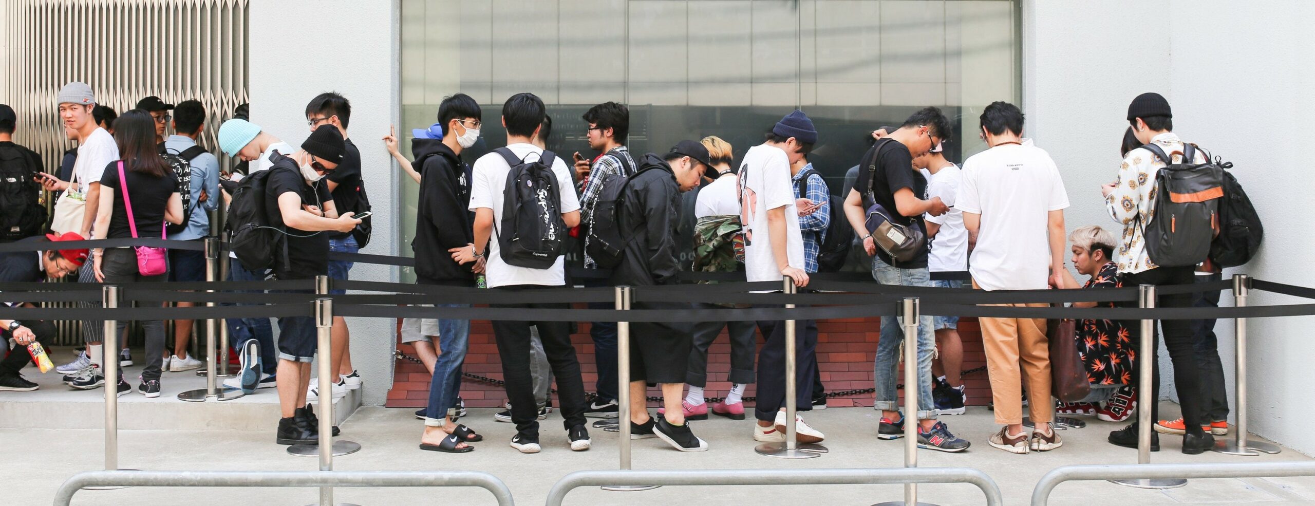 Fans of the Supreme Brand waiting in line to buy the new drop in 2017